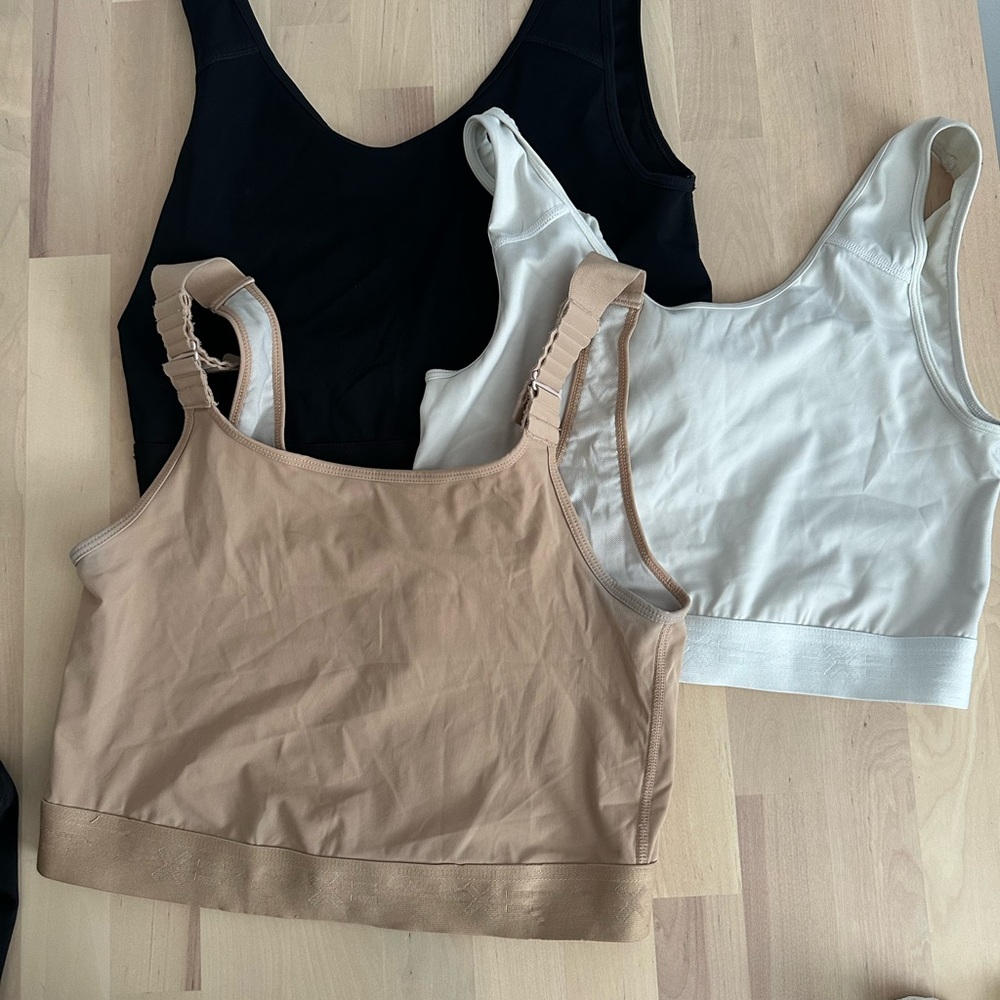 TomboyX - 3 Binders/Sports Bras Beige, White, Black. Used condition.